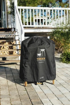 IGNIUM Abdeckhaube Schwarz Vaude -Webe Grill Geschaft TARAN Grill Abdeckhaube Moodbild Hersteller Ignium